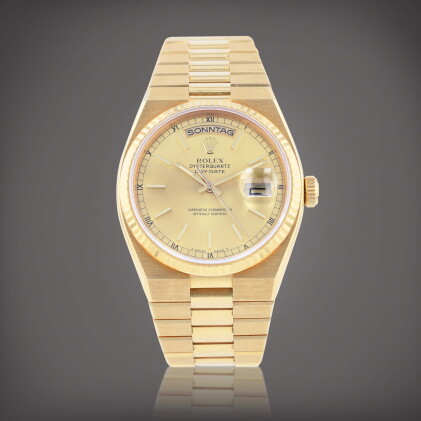 Catalog image of Oysterquartz Day-Date, reference 19018 Montre bracelet en or jaune avec jour et…