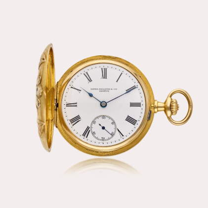 Catalog image of A yellow gold hunting cased keyless with engraving in relief, Circa 1905