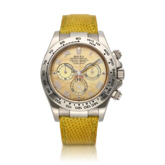 View 1 of Lot 26: Daytona 'Beach', Ref. 116519 | A white gold chronograph wristwatch with yellow mother-of-pearl dial | Circa 2001