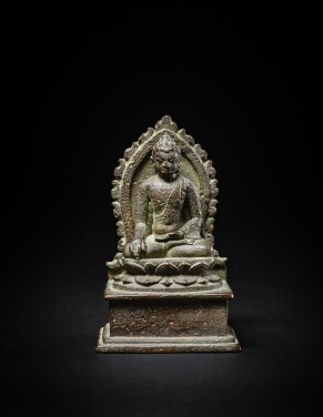 View 1 of Lot 4: A bronze figure of Shakyamuni Buddha, Java, 9th century