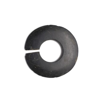 View 1 of Lot 226: A black stone slit disc (Jue), Neolithic period / Shang dynasty | 新石器時代 / 商 石玦