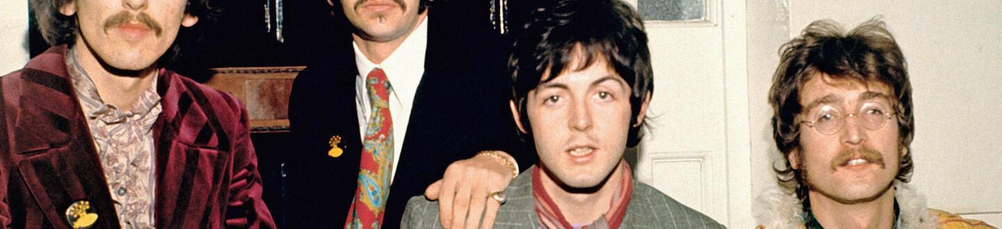 Publicity photo of The Beatles (George Harrison, Ringo Starr, Paul McCartney and John Lennon) at Abbey Road Studios