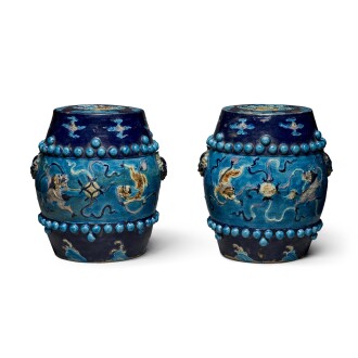 View 1 of Lot 633: A pair of Fahua-glazed 'Buddhist lions' garden seats, Ming dynasty, 16th century | 明十六世紀 琺華雙獅戲球紋坐墩一對