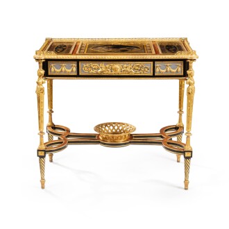 View 1 of Lot 595: A Louis XVI style writing table, after the model by Adam Weisweiller for Marie-Antoinette's bedroom at Château de Saint Cloud