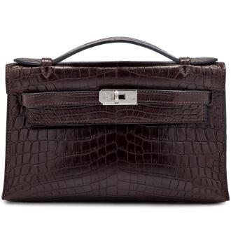 View 1 of Lot 1218: Marron Fonce Matte Niloticus Crocodile Kelly Pochette with Diamonds and White Gold, 2006
