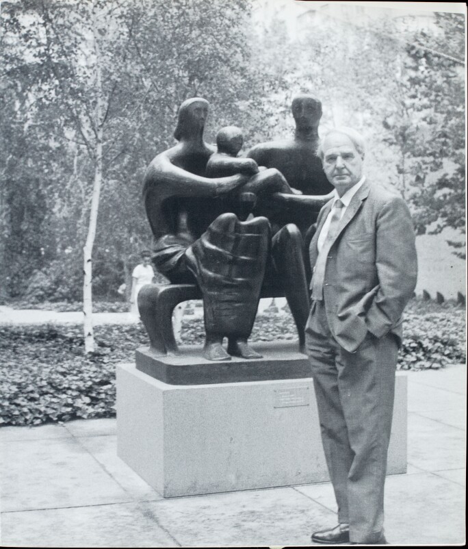 Henry Moore with Family Group, 1948-49, in the courtyard of the Museum of Modern Art