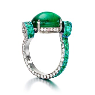View 1 of Lot 1022: Titanium, emerald and diamond ring, 'Assolo'   