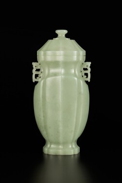 View 1 of Lot 202: A celadon jade barbed vase and cover, Qing dynasty, Qianlong period | 清乾隆 青玉菱花式夔龍耳蓋瓶