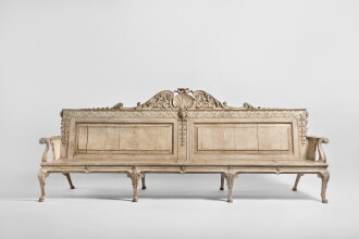 View 1 of Lot 10: A George II Gray-Painted Oak Hall Settee in the manner of William Kent,  Circa 1735