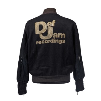 View 1 of Lot 10: Jazzy Jay's personalized Def Jam varsity bomber jacket, [ca. 1985]