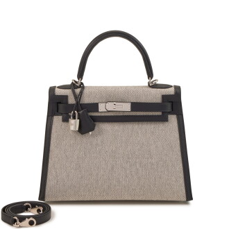 View 1 of Lot 80: Black Swift and Écru Toile Kelly 28 Sellier Palladium Hardware, 2020
