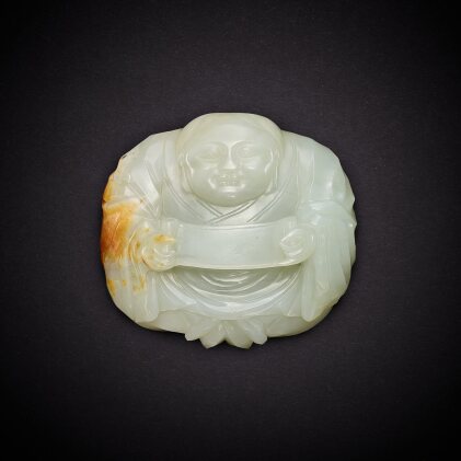 View 1 of Lot 6919: A white and russet jade belt buckle, Qing dynasty, 18th century | 清十八世紀 白玉一團和氣帶扣