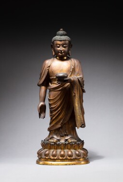 View 1 of Lot 143: A gilt-bronze figure of Amitabha Buddha, Qing dynasty Kangxi period, 17th-18th century | 清康熙 十七至十八世紀 鎏金銅阿彌陀佛立像