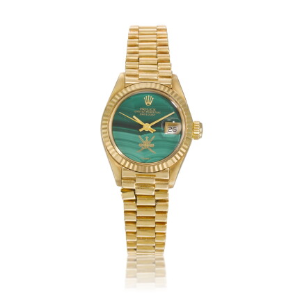 Catalog image of Lady Datejust with khanjar, Ref 6917 18k yellow gold and malachite wristwatch w…