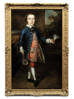 Catalog image of Portrait of a young boy playing badminton