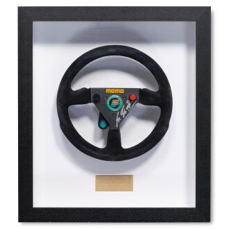 View 1 of Lot 26: Michael Schumacher 1992 Benetton B192 Race Used and Signed Steering Wheel | Attributed to 1st Career Grand Prix Victory | Team Benetton Letter of Provenance