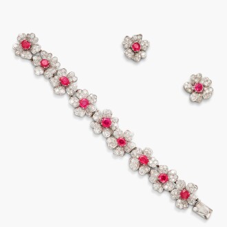 View 1 of Lot 276: Ruby and Diamond Bracelet and Pair of Pink Sapphire and Diamond Earclips 