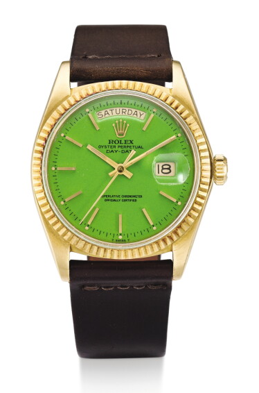 A RARE YELLOW GOLD AUTOMATIC CENTER SECONDS WRISTWATCH WITH DAY,
