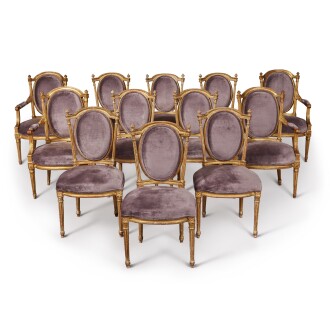 View 1 of Lot 227: A Matched Set of Twelve Louis XVI Giltwood Dining Chairs, The Four Armchairs Circa 1780, the Eight Side Chairs of a Later Date