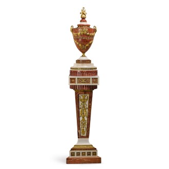 View 1 of Lot 91: A Spanish gilt-bronze mounted rojo alicante and white marble vase on pedestal, late 18th century, attributed to the Fabrica del Buen Retiro