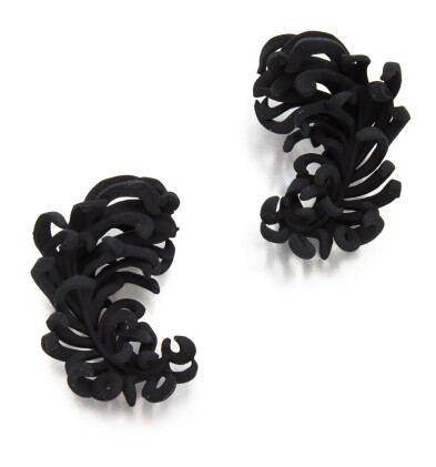 Catalog image of pair of resin 'tickle me feather' earclips, jar, france