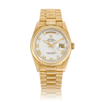 Catalog image of Day-Date, Ref. 18238 | A yellow gold wristwatch with day, date and bracelet | C…