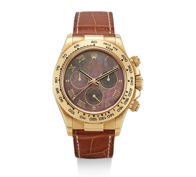 A COSMOGRAPH DAYTONA, REFERENCE 116518, DISPLAYING A VARIATION IN DIAL COLOR. BID NOW.