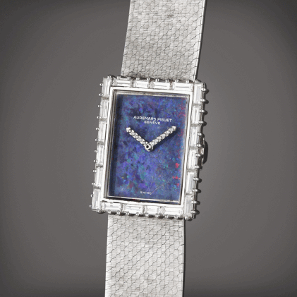 Catalog image of Reference 8437BC | A white gold and diamond-set bracelet watch with opal dial, …