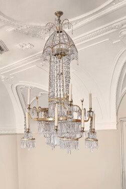 View 1 of Lot 507: A German gilt-bronze-mounted twelve-light crystal chandelier, circa 1800, attributed to Werner & Mieth