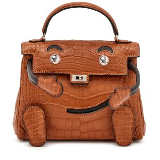 View 1 of Lot 5: Matte Gold Alligator and Ebene Swift Quelle Idole Kelly Doll Palladium Hardware, 2021