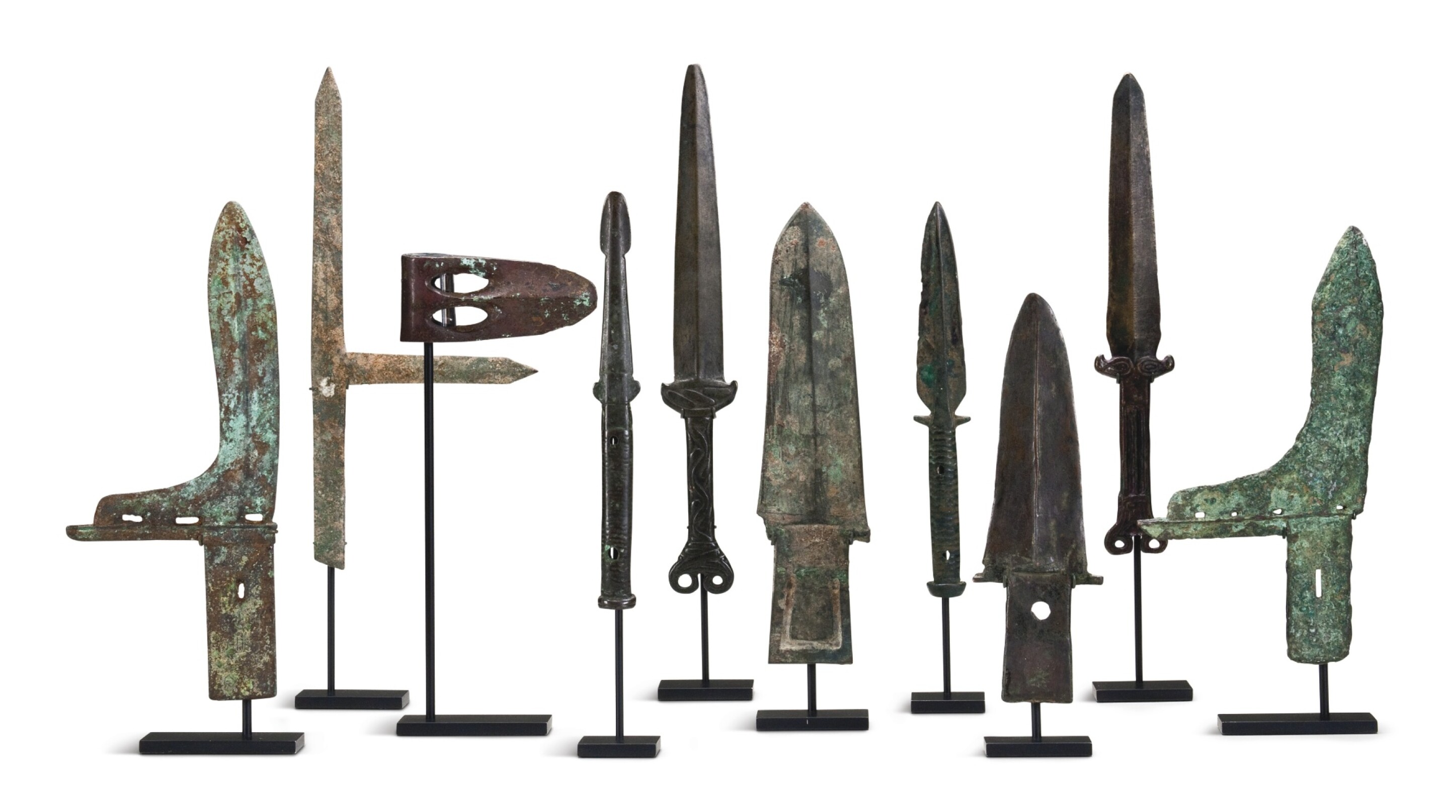155 A SET OF TEN CHINESE BRONZE WEAPONS AND IMPLEMENTS EASTERN ZHOU 155 a set of ten chinese bronze weapons and implements eastern zhou
