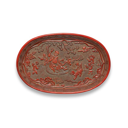 a carved cinnabar lacquer 'tiger-taming luohan' tray, ming dynasty, 16th century