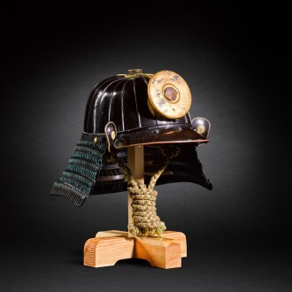 View 1 of Lot 2: A Haruta school suji-bachi [helmet with raised ridges] and ho-ate [half mask] | Muromachi period, 16th century