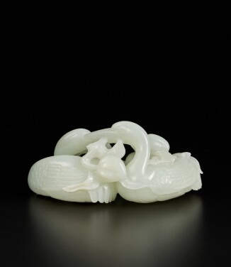 View 1 of Lot 206: A white jade 'crane and peach' group, Qing dynasty, 18th / 19th century | 清十八 / 十九世紀 白玉雕瑞鶴銜桃把件