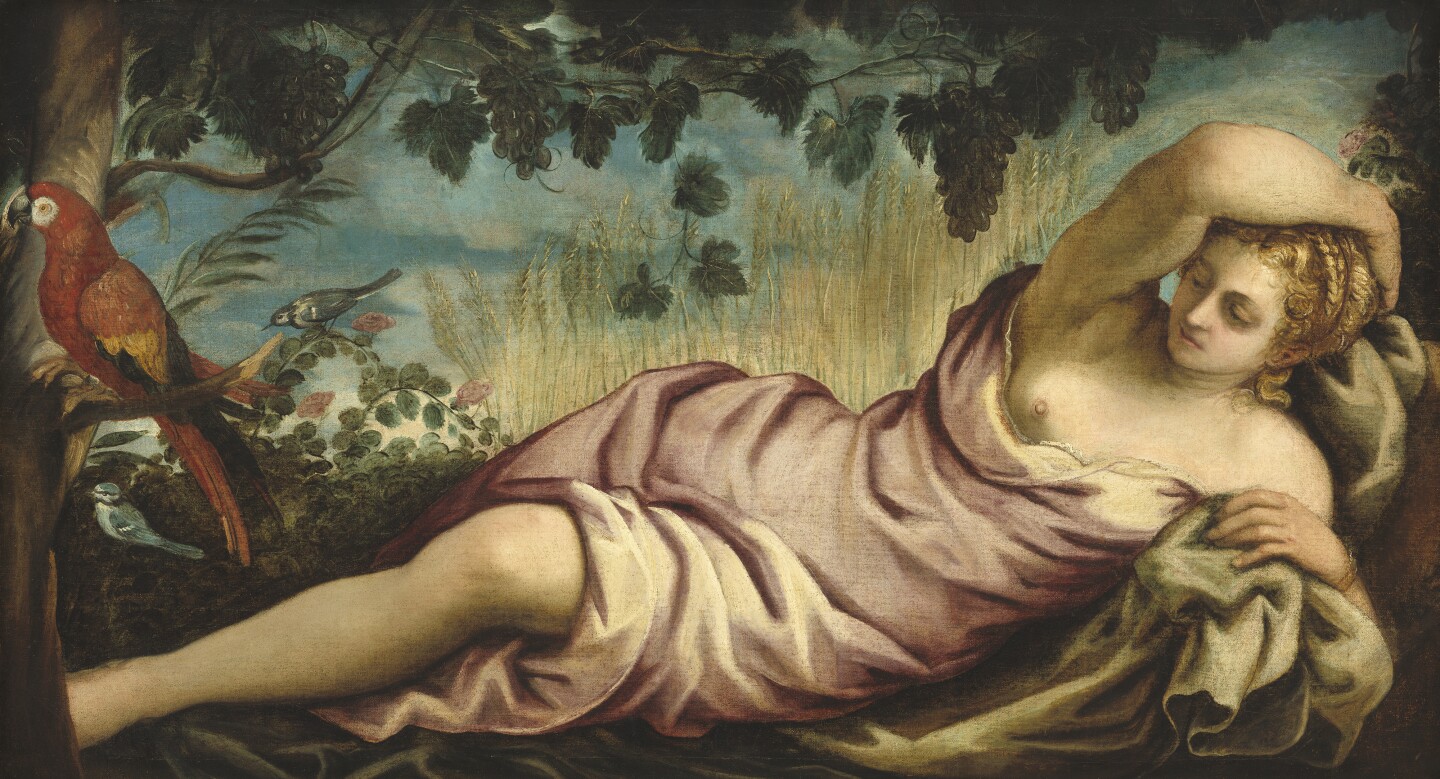 Women reclining in a dress with a red parrot