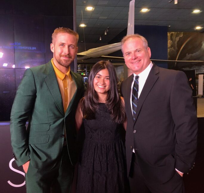 Chris Calle, right, stands with his daughter Arianna, middle, and actor Ryan Gosling, left, at the premiere of “First Man” at the Air and Space Museum in Washington D.C. on 4 October 2018.