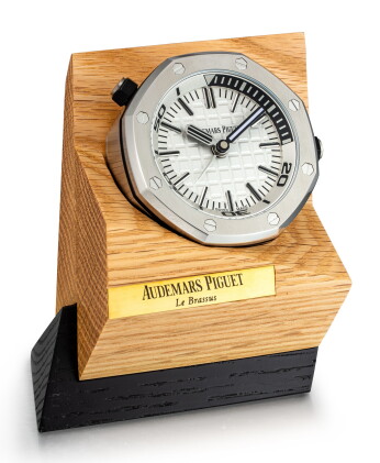 Catalog image of Royal Oak, A stainless steel alarm desk clock with wooden stand, Circa 2017 | 愛…