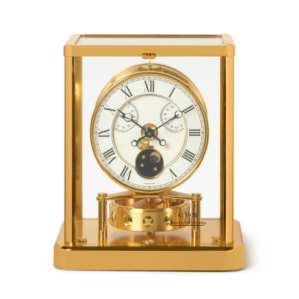 Catalog image of Atmos Elysee, Ref. 223.107.3 Gilt brass clock with moon phases, thermometer and…