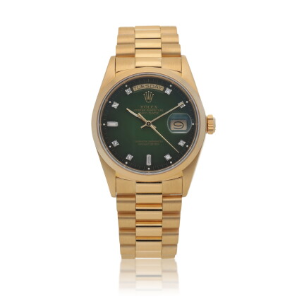 Catalog image of Day-Date, Ref. 18028, Yellow gold and diamond-set wristwatch with day, date, br…
