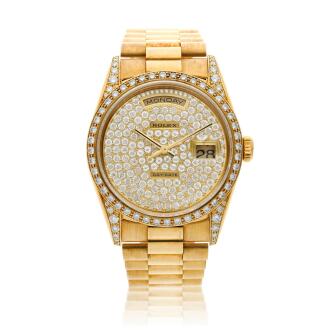 View 1 of Lot 22: Reference 18388 Day-Date, A yellow gold and diamond-set wristwatch with day, date and bracelet, Circa 1994