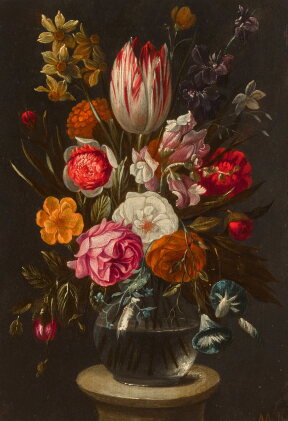 Catalog image of A tulip, roses, irises, daffodils and other flowers in a glass vase atop a circ…