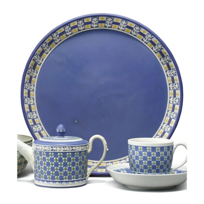 Catalog image of a wedgwood three-color jasper-dip circular tray and a cup and saucer circa 1850…