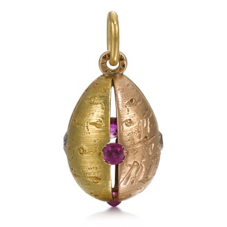View 1 of Lot 450: Birchwood: A jewelled varicoloured gold segmented egg pendant, probably Fabergé, St Petersburg, 1904-1908