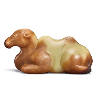 View 1 of Lot 3622: An outstanding and large yellow and russet jade figure of a camel, Ming dynasty | 明 黃玉駱駝