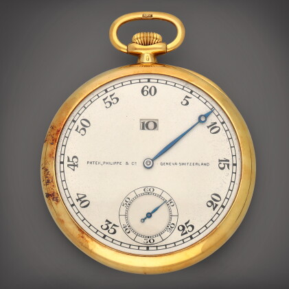 Catalog image of Retailed by À L'Émeraude | A yellow gold open-faced jump hour watch | Circa 1927