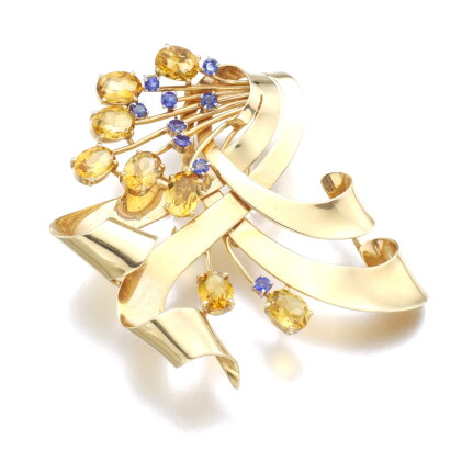 Catalog image of trabert & hoeffer mauboussin | citrine, sapphire and gold brooch, 'reflection', 1940s