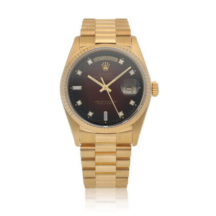 Catalog image of Day-Date, Ref. 18038 Yellow gold and diamond-set wristwatch with day, date, bra…