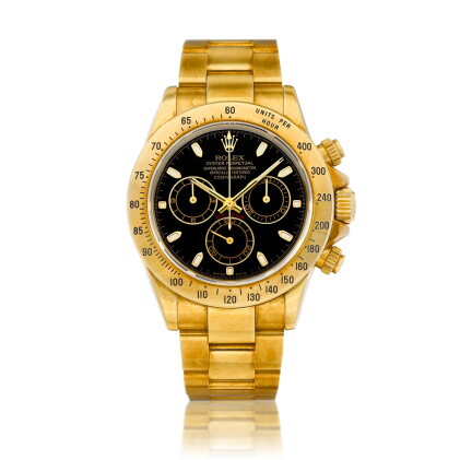 Catalog image of Cosmograph Daytona, Reference 116528 | A yellow gold chronograph wristwatch wit…