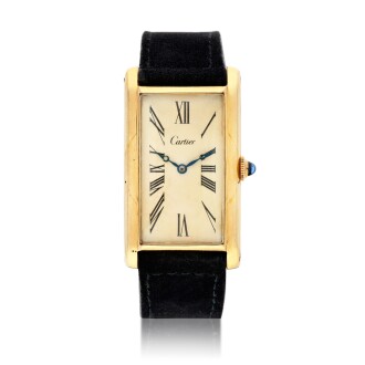 View 1 of Lot 139: Tank, A yellow gold rectangular wristwatch, Circa 1940