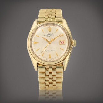 View 1 of Lot 139: 'Ovettone' Datejust, reference 4467 Montre bracelet en or jaune avec date et bracelet |  Yellow gold wristwatch with date and bracelet Vers 1947 |  Circa 1947